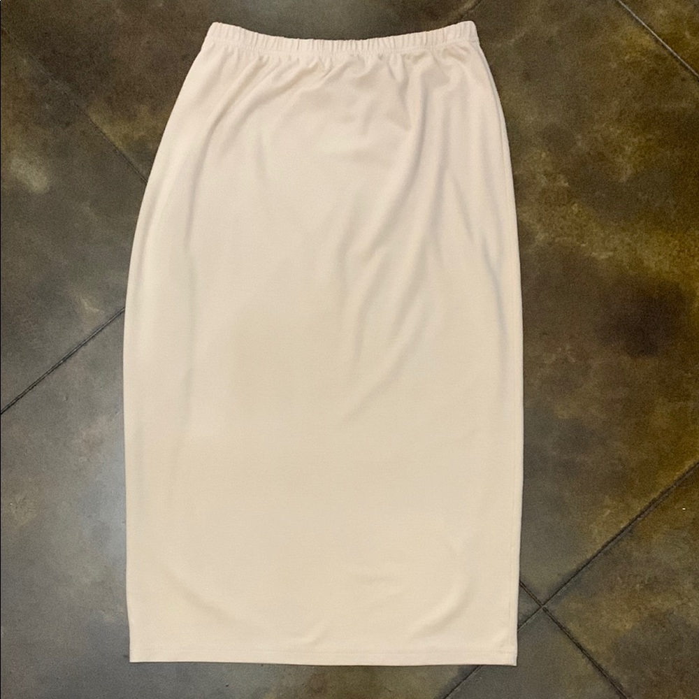 Nuggles brand nude color skirt. Excellent condition. Never worn.